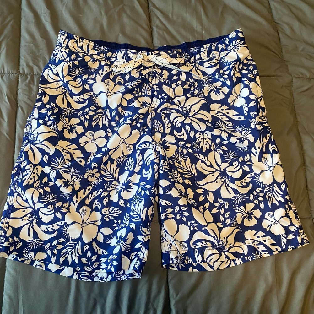 Blue and white flower swim trunks